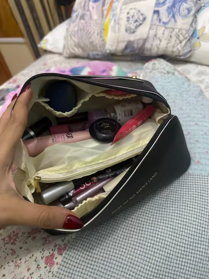 Customer photo of the black organiser