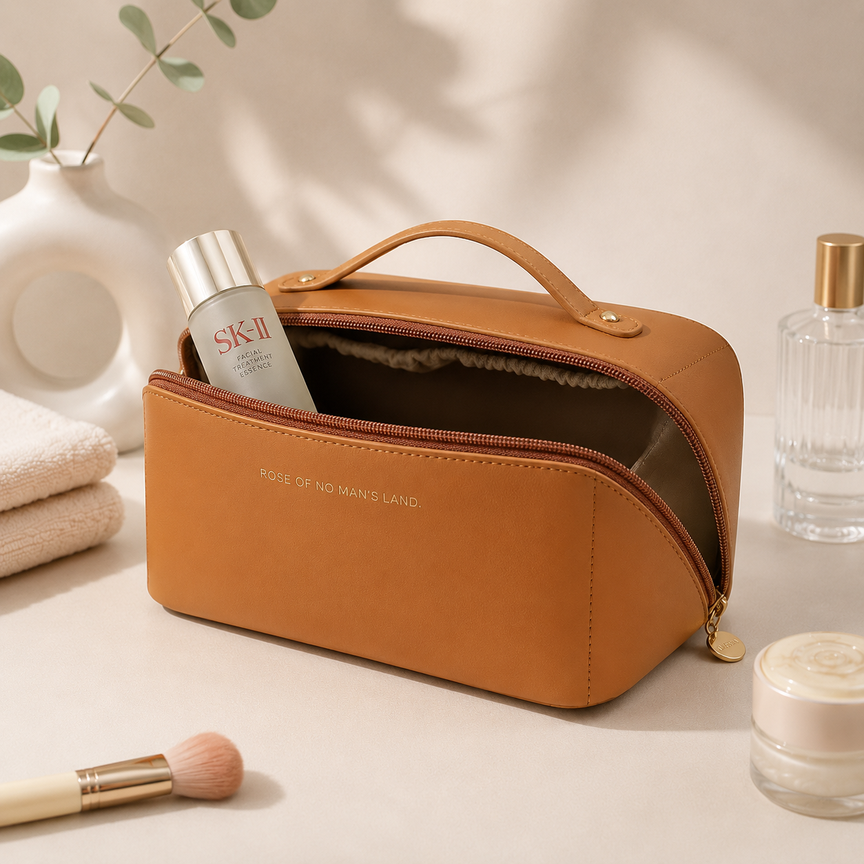 Organiser bag open flat, full of makeup and skincare